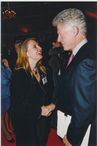 Michelle Tennant discusses SOS Children's Villages with Bill Clinton.